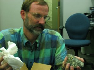 Phil removing a rock from its wrapping