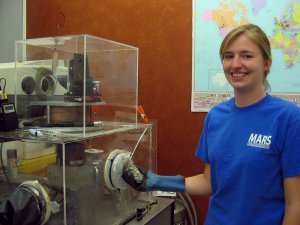 Laurie puts the rock into the spectrometer